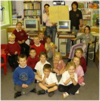 Nursery children with Edubuntu PCs